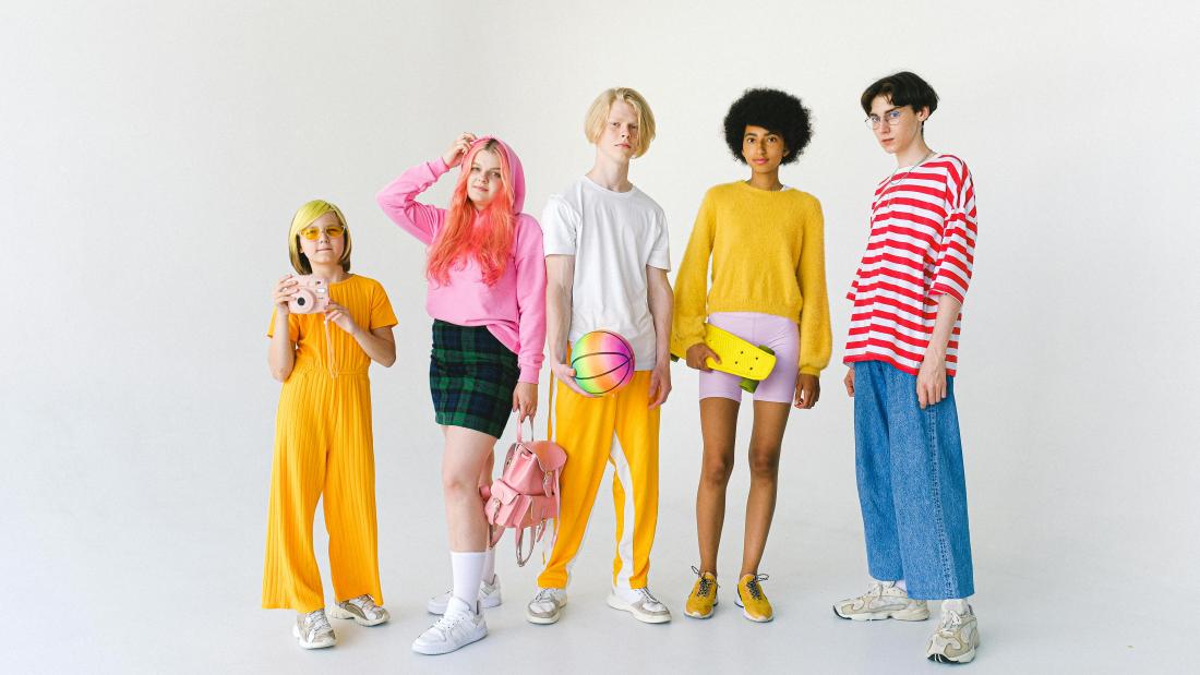 Gen-z 5 individuals waering colourful clothing