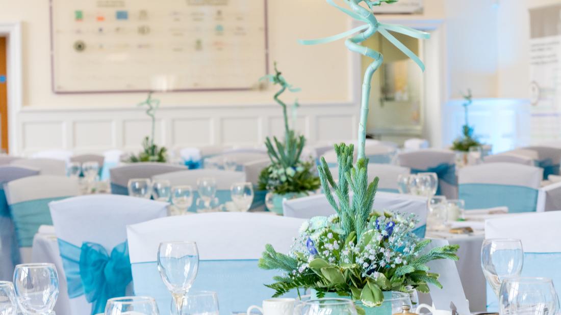 Banqueting set up with focus on flowers