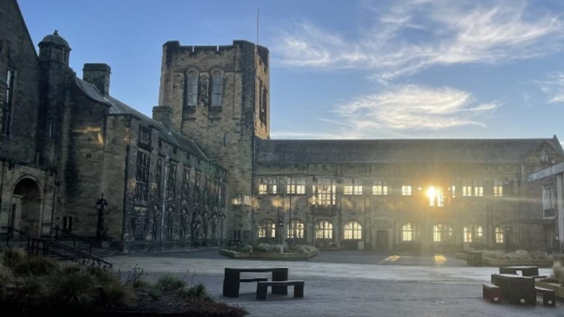 A photo of Main Arts from the quad at dusk
