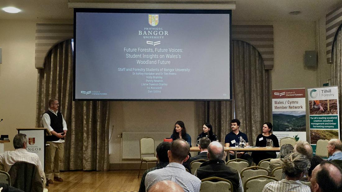 Wales Centenary Conference. Forestry at 100: A Century of Growth, A Future of Possibility. Panel discussion featuring forestry students Llanw Dawson-Stanley, Dan Gittins, Holly Bramley and Penny Newton. Chaired by Dr Ashley Hardaker, Lecturer in Forestry, with Dr Tim Peters, Lecturer in Woodland Management.