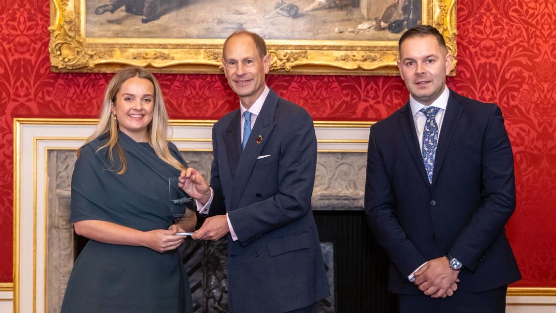 Dr Libby Steele being presented with her trophy by Alliance President, HRH The Duke of Edinburgh, alongside a representative from Pri0r1ty Intelligence Group.