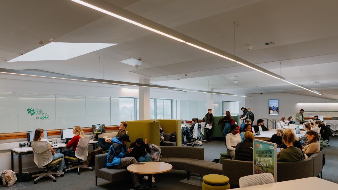 students studying and talking in Pontio 