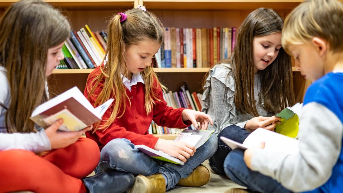 Primary school age children reading