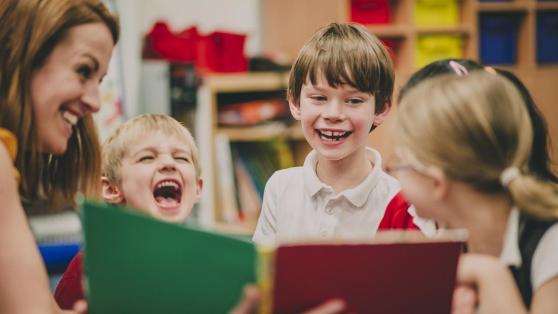Teacher and children reading