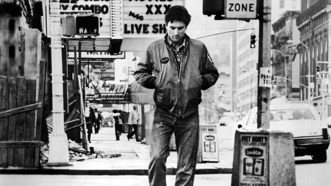 The iconic image from Taxi Driver of loner Travis Bickle, played unforgettably by Robert De Niro.