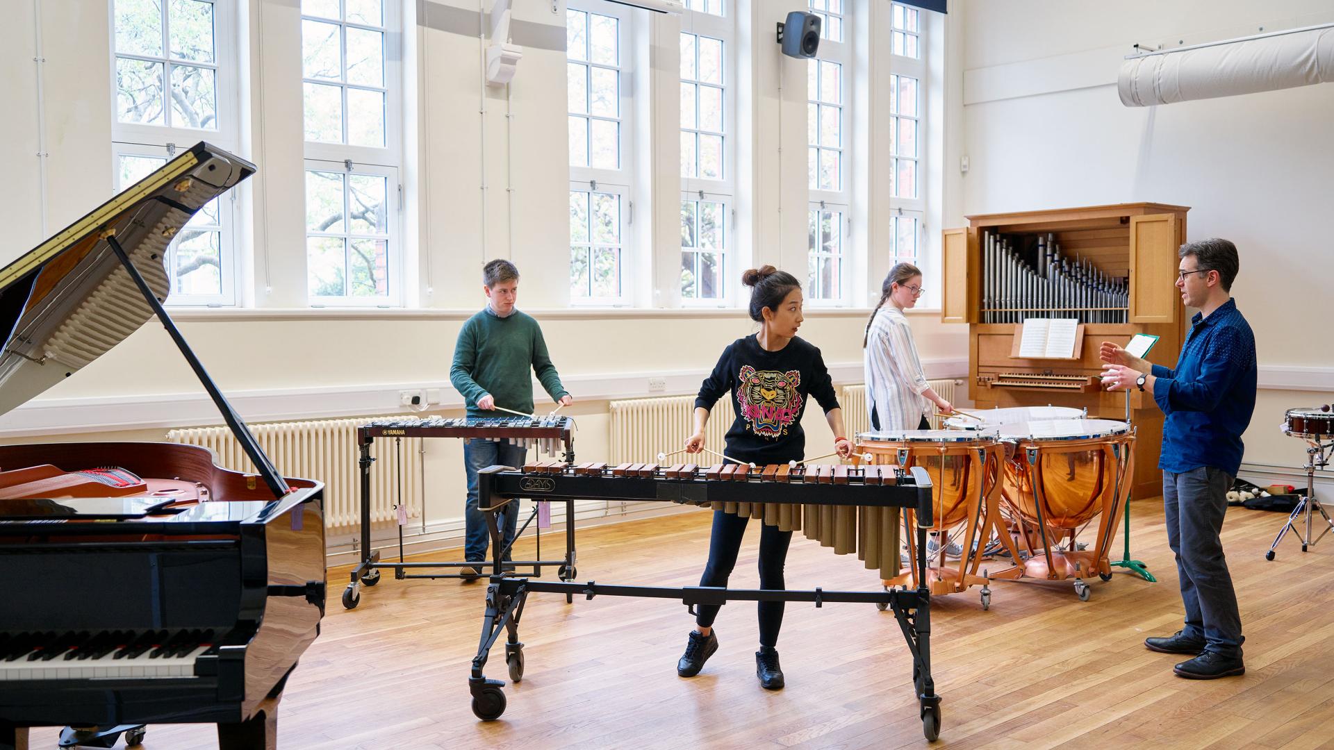 Students playing musical instruments