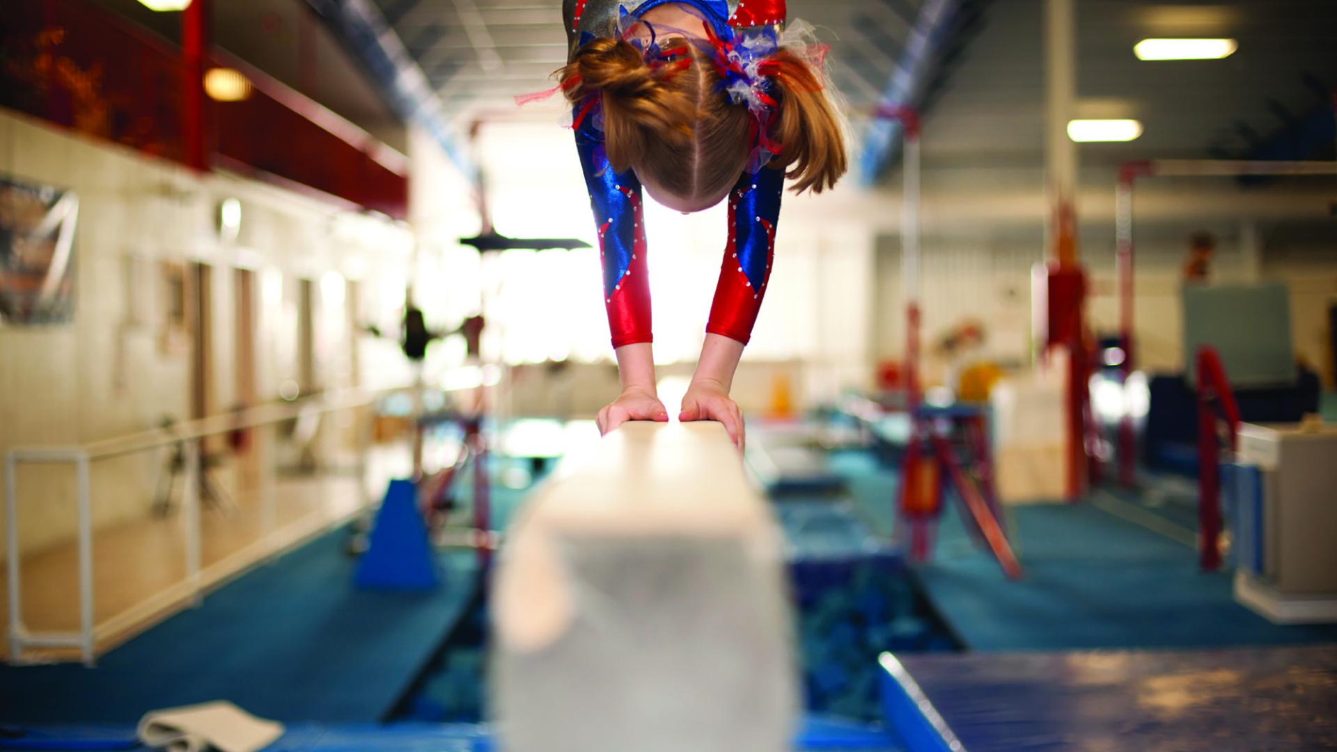 A girl doing gymnastics