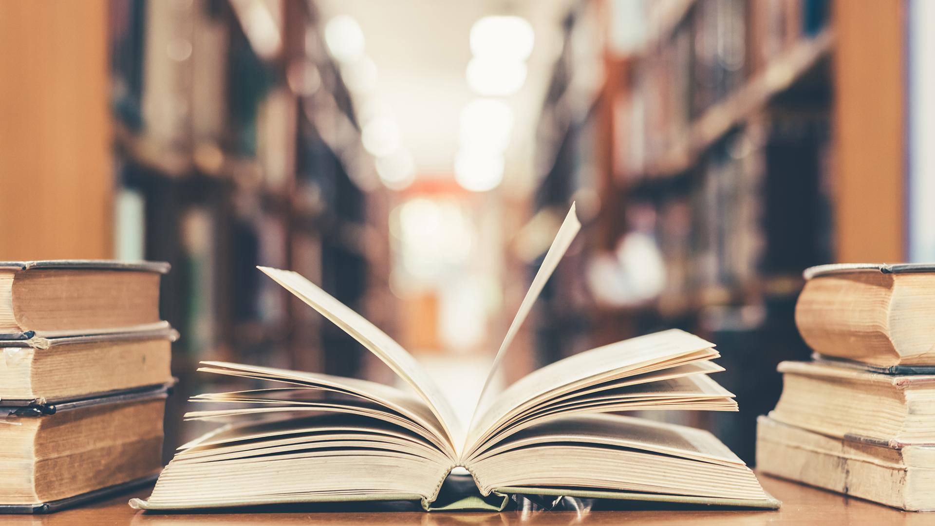 Close-up of an open book in a library