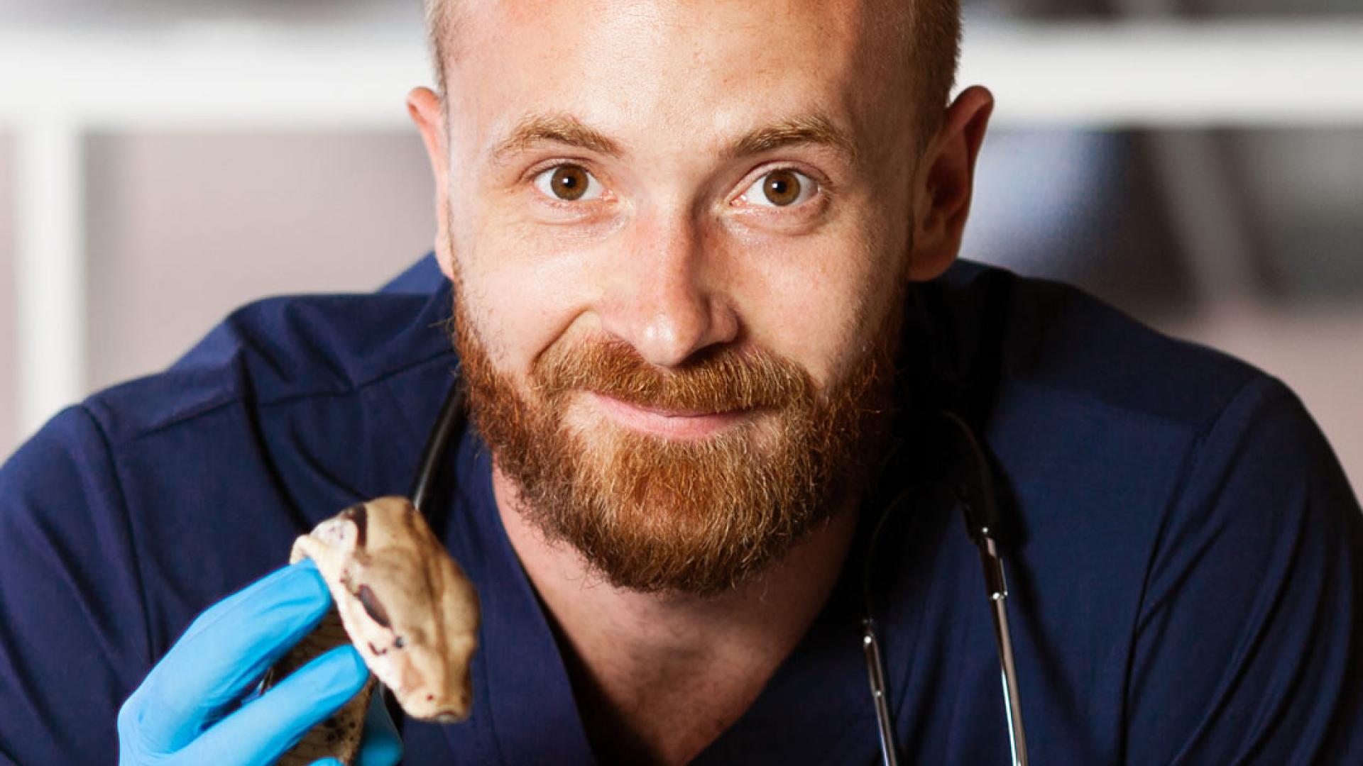 Scientist with snake