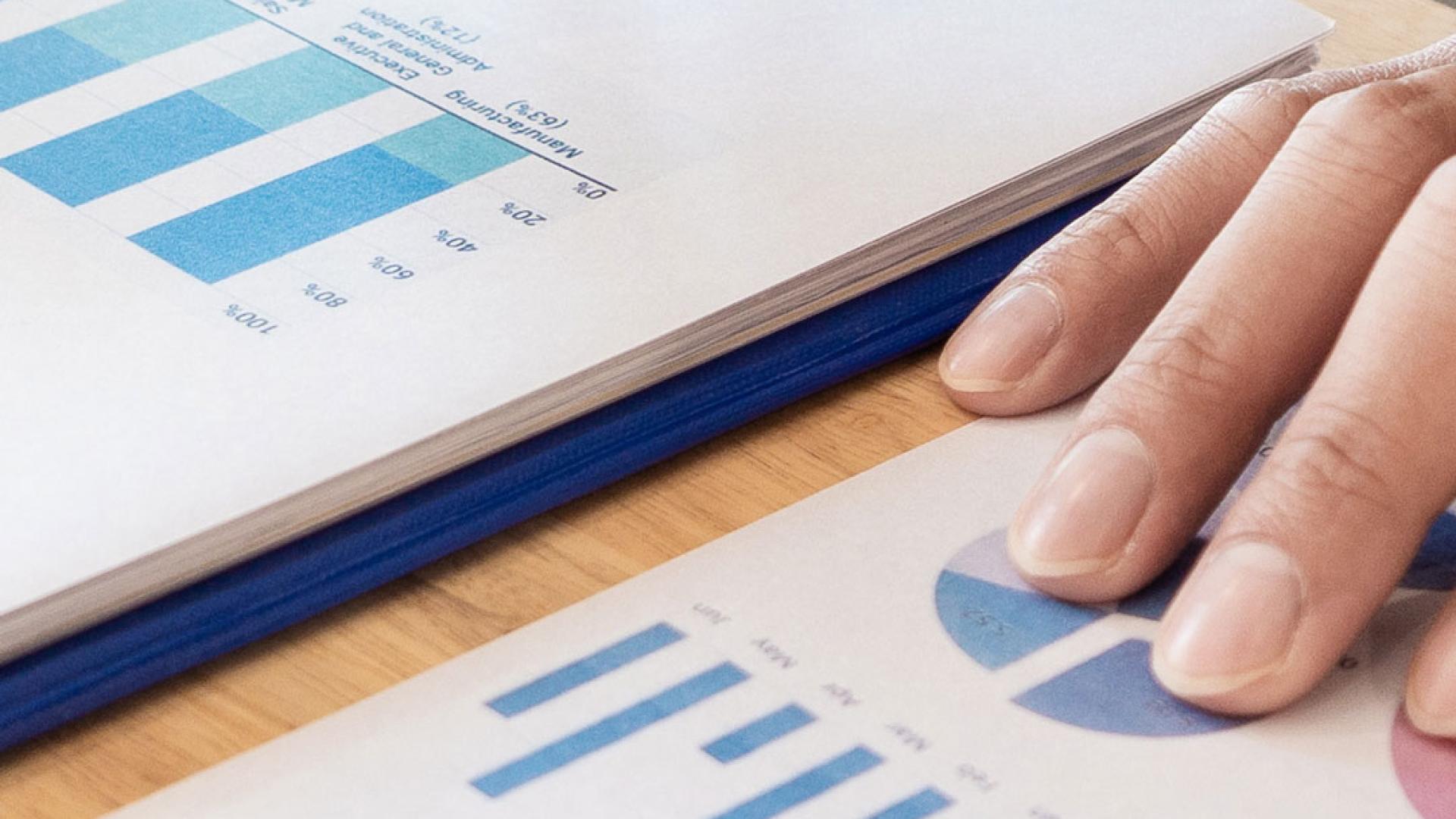 Meeting looking at financial charts