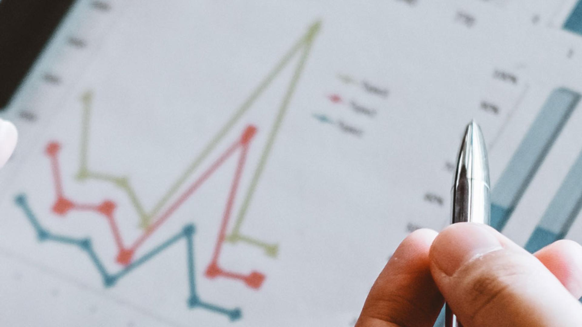 Financial charts being viewed in a business meeting