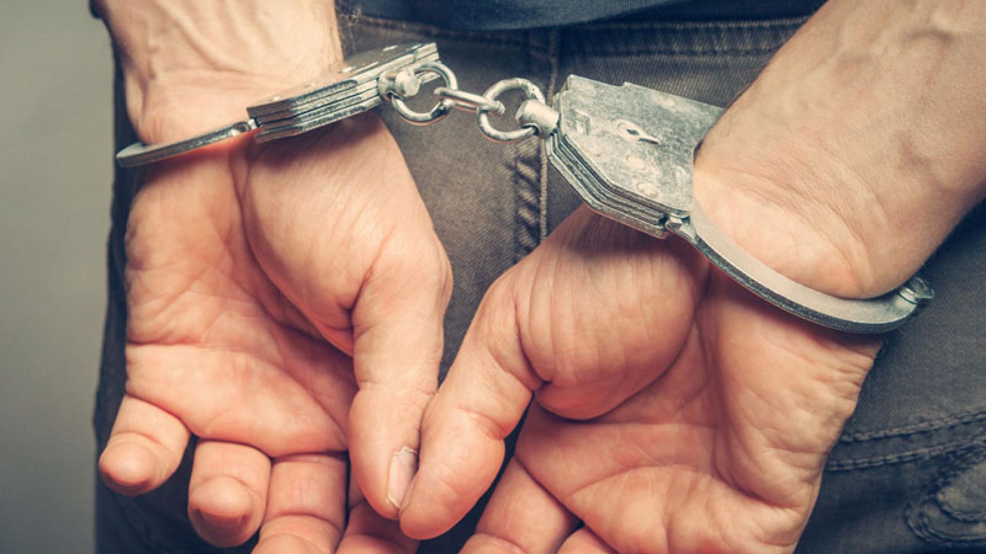 criminal in handcuffs