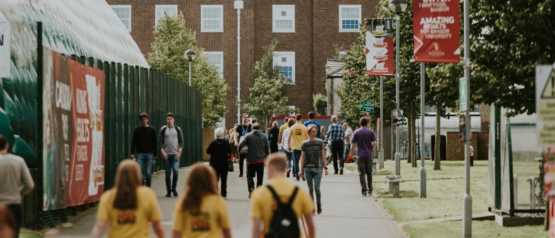 Peer Guides walking through the Ffriddoedd Student Village during Welcome Week