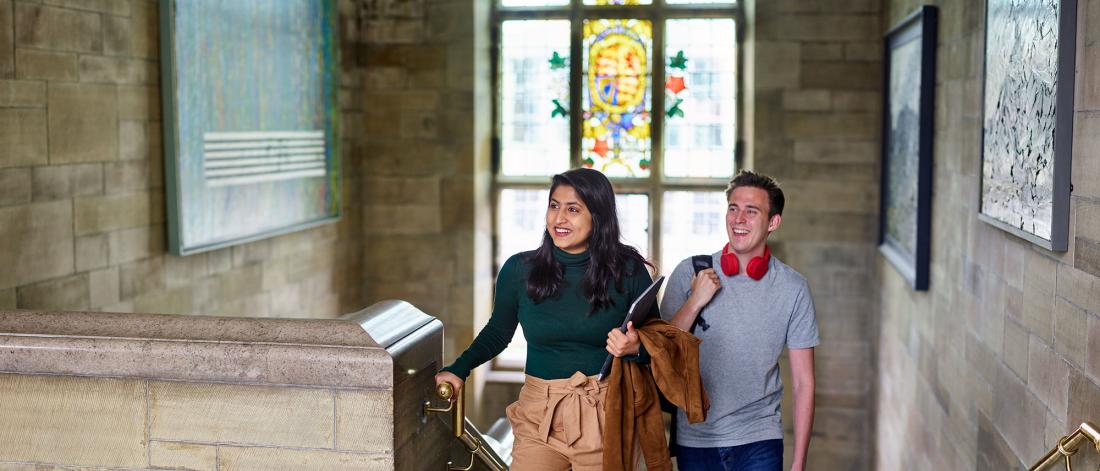 Students coming up stairs in Main Arts building