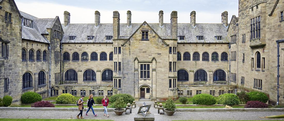 Main Arts inner quad with people walking across