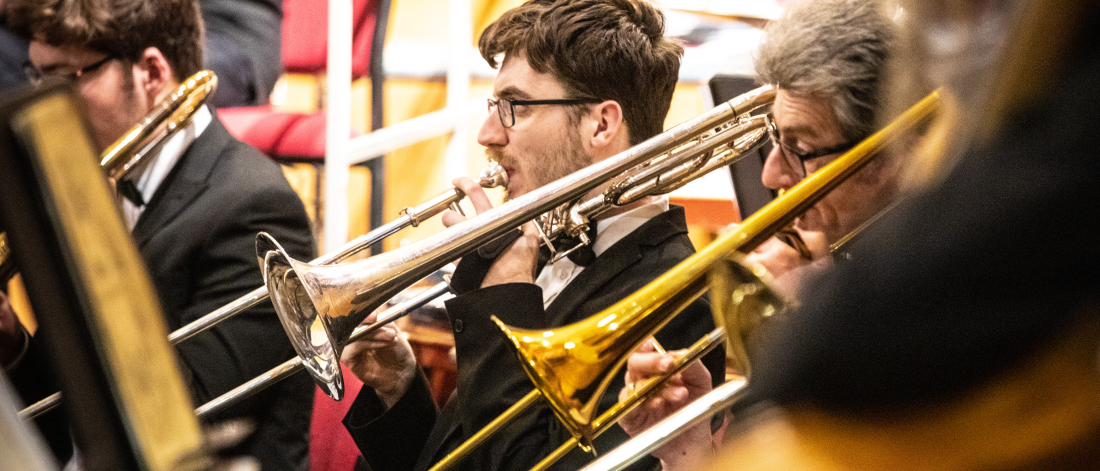 photo of someone playing a brass instrument