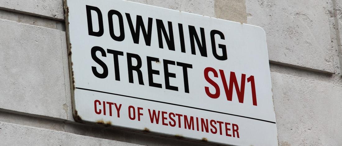 Street sign with Downing Street on it 