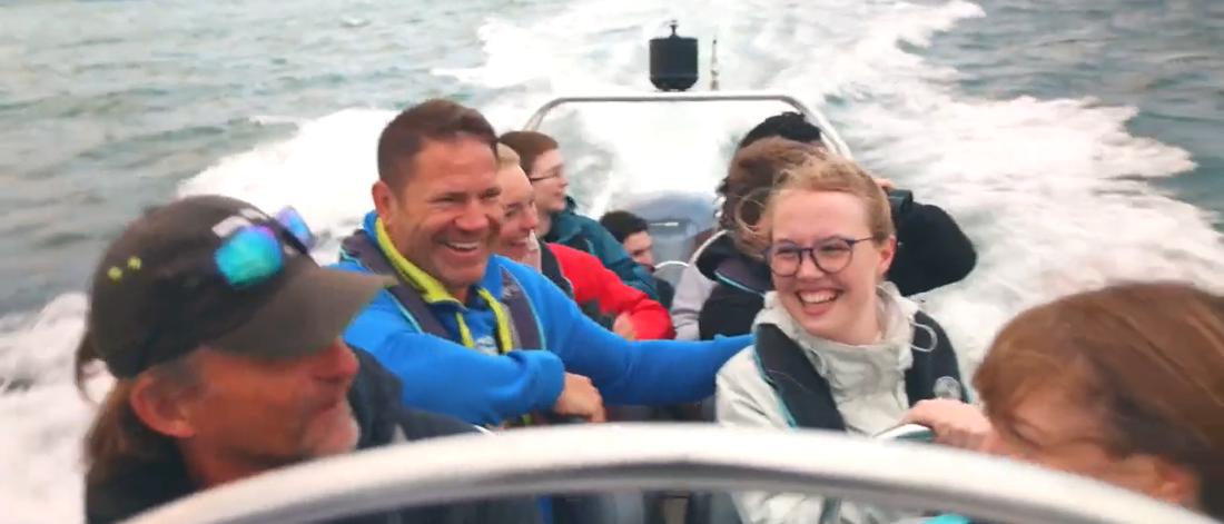 Bangor University Natural Sciences students on a rib boat with Steve Backshall