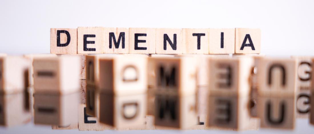 DEMENTIA written with Scrabble tiles