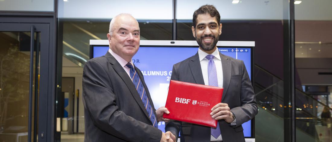 Hasan Sater receiving his award from Prof. Andrew Edwards