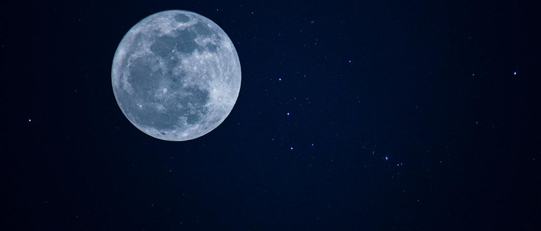 Picture of the moon and stars in the nights sky