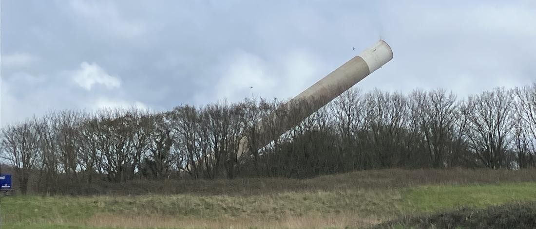  chimney fallingmid-demolition