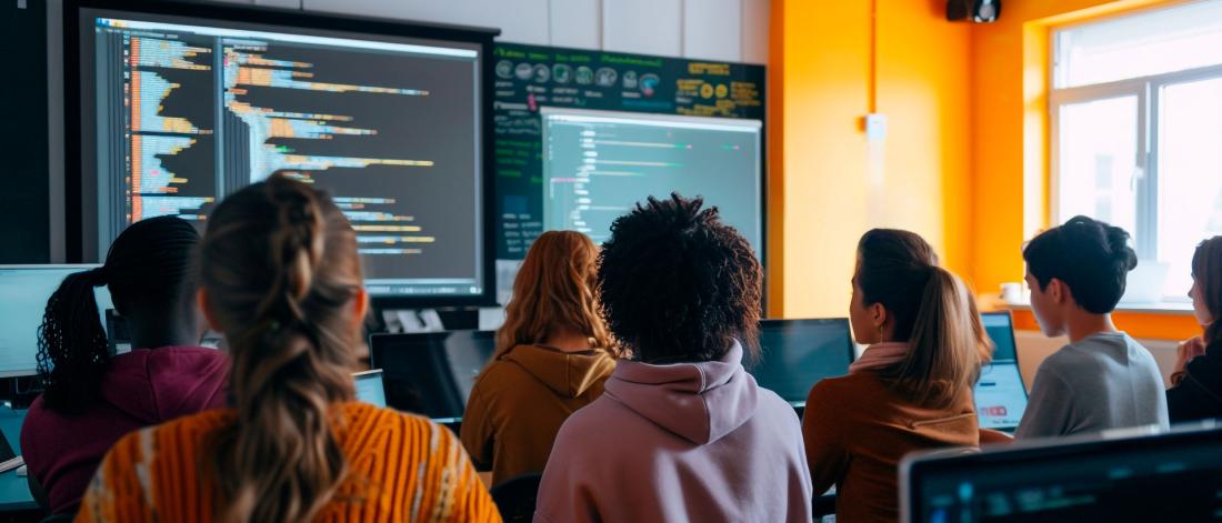 Students looking at a screen in a lecture