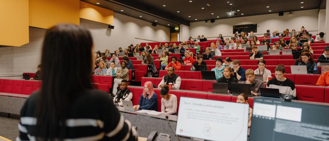 Students attending a lecture at Bangor University