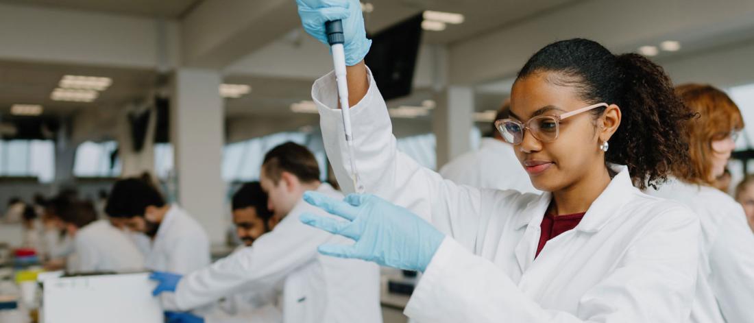 Biomedical Science Student working in a lab