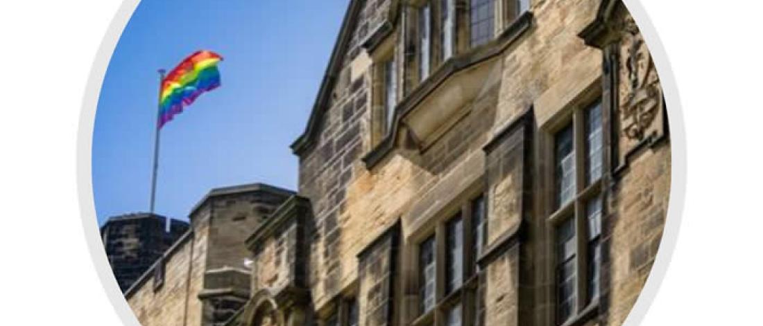 LGBTQ+ Flag Flying Above Main Arts Building
