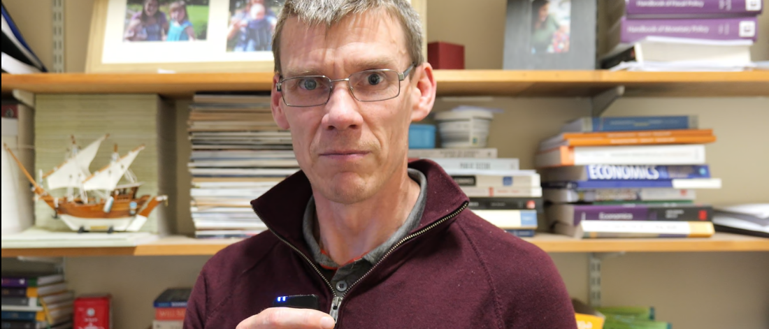 a headshot of Rhys Ap Gwilym CY