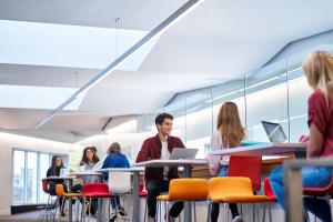 Students using the social learning area at Pontio