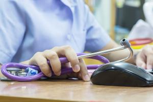 Nurse holding a stethoscope 