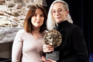 Enlli Fychan Owain and Lindsay Walker with their BAFTA Cymru award