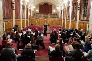 people singing in a choir