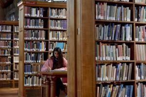 Student working in Bangor University Library