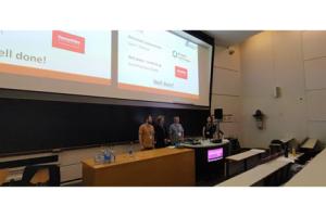 lecture given by Iwan and Franck in a lecture room with information being presented on the board 