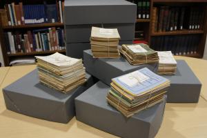 Photo of some archival boxes and recently acquired material
