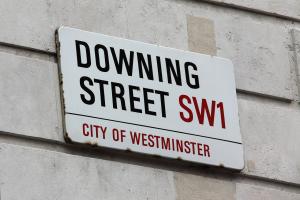 Street sign with Downing Street on it 
