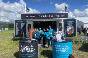  Banor University stand with people standing outside