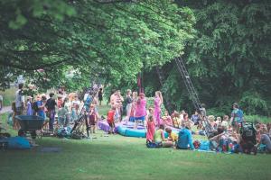 People in a festival in a field