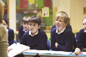 children listening to teacher