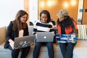 Three Woman in Front of Laptop Computer