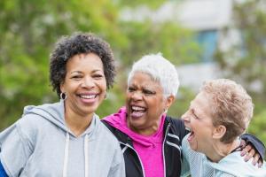 three women laughing