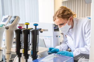 Researcher at Bangor University's waste water surveillance lab