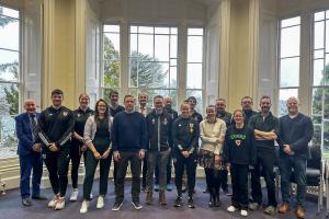 Group picture of students and members of the FAW team