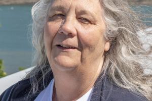 Image of Professor Shelagh Malham with the Menai Strait in the background