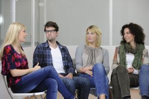 Men and women sitting together