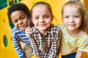 Group of primary school children smiling together