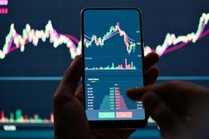 cyrptocurrency, phone, hands, graphs